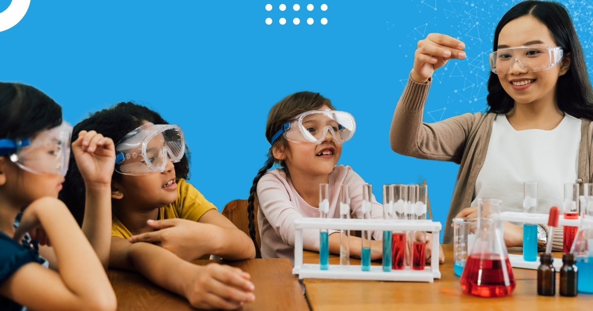 Teacher conducting a hands-on science experiment with young students in a Montessori classroom.