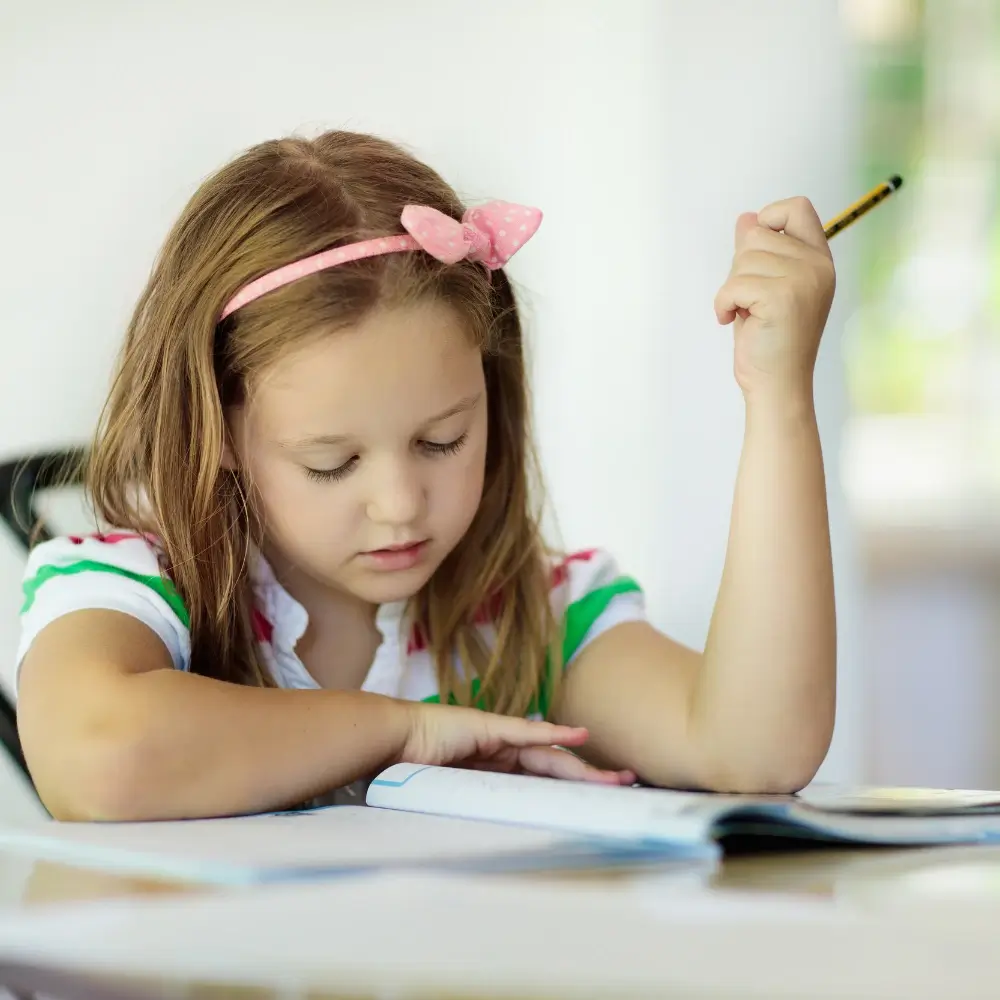 a girl reading, Explore Our Learning Materials